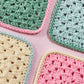 Multi coloured crochet coasters