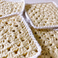 flower crochet coaster set - yellow